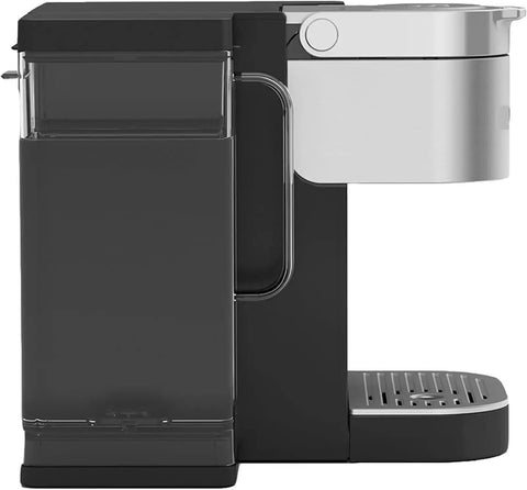 Side view of a black and silver commercial espresso machine with large water reservoir for office break room or home kitchen use.
