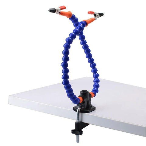 Two Arm Third Hand Soldering Station with flexible blue arms and non-slip clamp attached to a table edge for PCB work.