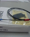 KEYENCE FU-49U Digital Fiber Optic Sensor For Industrial Automation, high-speed plug-and-play sensor with packaging visible on table