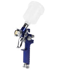Pro Grade Mini Pneumatic Spray Gun With Swappable 0.8 And 1.0 Mm Tips For Car Repair Wall Refresh And Craft Builds Delivers A Sick Finish Every Single Time side view showing clear fluid container