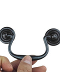 Four Pack Antique Black Three And A Half Inch Hole Center Drawer Pull Handles Gooseneck Ring Pullers for cabinets close-up view
