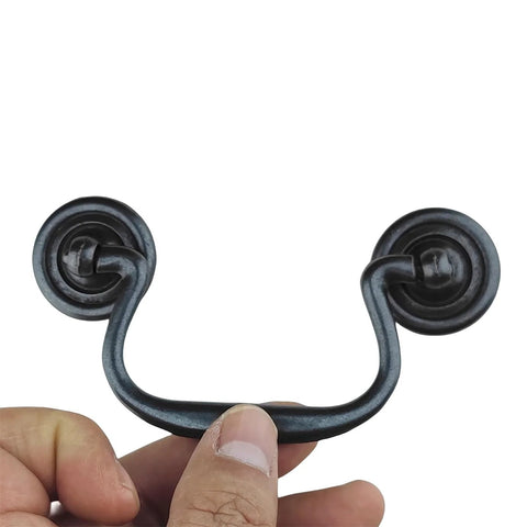 Four Pack Antique Black Three And A Half Inch Hole Center Drawer Pull Handles Gooseneck Ring Pullers for cabinets close-up view