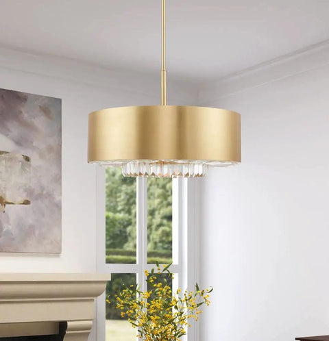 Gorgeous Six Light Pendant Featuring Brushed Nickel Drum Shade And Clear Faceted K9 Crystals illuminating a living room.