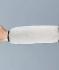 Heavy Duty Waterproof Arm Sleeves For Adults Built Tough And Oil Resistant Elastic Long Arm Guards on a hand.
