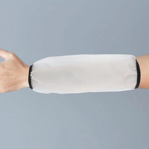Heavy Duty Waterproof Arm Sleeves For Adults Built Tough And Oil Resistant Elastic Long Arm Guards on a hand.