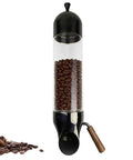 Wall Mounted Coffee Bean Dispenser Adjustable Glass Jar Keeps Beans Fresh Every Morning Kitchen Setup sleek black canister with coffee beans.