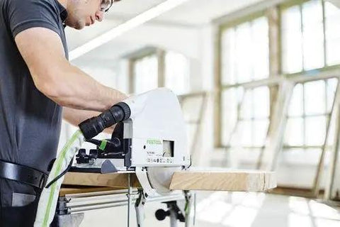 Badass Zero Fuss Plunge Saw With Aluminum Track Guide For Dial In Accuracy And Smooth Laminate Cuts 1600 Watt Motor in use on wood plank.
