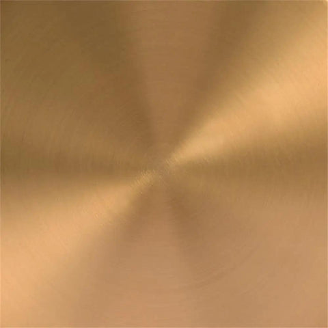 Close-up of brass finish detail on globe and stem floor lamp with white plastic shade, cozy warm glow for living rooms, rock modern vibe.