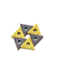 Five TNMG160404 carbide inserts in yellow and purple for the Top Tier Indexable Carbide Lathe Tool for tough metal jobs.