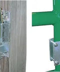 Heavy Duty Two Way Livestock Gate Latch Four Pack Lockable Farm Fence Hardware on green fencing, showing one handed operation.