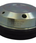 Electromagnetic brake component; round silver metal housing with mounting holes and black rubber seal.