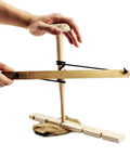 Hands using Friction Bow Drill Fire Starter Kit for Outdoor Survival, wood fire making tool, emergency igniter, durable and easy to use