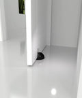 Magnetic Door Stop No Drill Self Adhesive Floor Door Stopper Stainless Steel Black 4 Pack installed on white door keeping it open