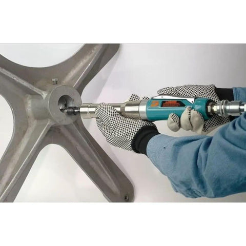 One Horsepower Straight Line Extension Die Grinder works on a metal part for precise deburring and finishing tasks.