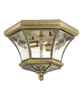 Monterey Two Light Outdoor Indoor Flush Mount in Polished Brass Finish with Clear Beveled Glass, solid brass fixture, classic style