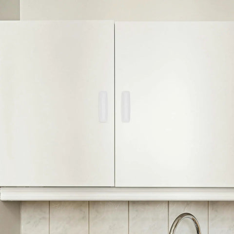 Top Grade No Hassle Self Adhesive Cabinet Handles Pair White Pp Drawer Knobs mounted on white cabinet doors.