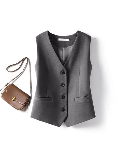Women's Vintage Layering Vest In Cotton Stretch With Side Elastic Panels And Back Mesh Design For That Relaxed Old Money Vibe And Super Comfy All Season Fit In Warm Brown, shown in gray with buttons and pockets.
