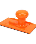 Kickback Proof Woodworking Push Block for Table Saw and Router Built With a Slick Non Slip Rubber Pad and Bulky Ergonomic Handle for Dead On Milling Control, orange design.