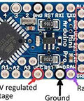 Top view of 3.3V 8MHz Pro Mini ATmega328 Development Board For Arduino With No USB On Board, showing programming and voltage connections.