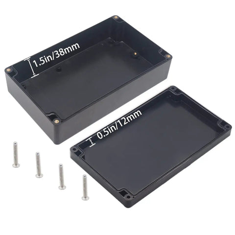 Interior view of Watertight IP67 Junction Box For DIY Projects, Tough As Nails ABS Plastic Electronic Enclosure Case in Black, 7.87 x 4.72 x 2.20 Inches with screws
