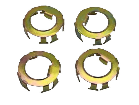 Four zinc-coated trailer spindle nut retainers with tabbed edges for Dexter axles; 4-pack.