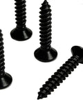 Close-up of 380 Pieces Black Self Tapping Screws Set In Carbon Steel With Flat Head, highlighting durable dark finish and corrosion resistance