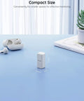 Three Pack WiFi Hygrometer Thermometer Sensor with App Alerts displayed on a desk, showing compact size, ideal for home or greenhouse use.