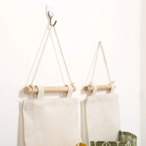 Score Major Closet Wins With This Over Door Hanging Shoe Organizer Bag Crafted From Soft Cotton Linen Featuring Roomy Pockets For Smart Bedroom Bathroom And Garage Storage Solutions hung on wall.