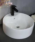 USZWBY Vessel Sinks Bathroom Sink Simple Single Basin Toilet Ceramic Above Counter Home Balcony Wash Bathroom Bowl Sink with black faucet.