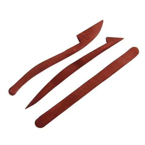 Premium Five Piece Solid Rosewood Sculpting Tools And Clay Molding Knives Built To Handle Daily Pottery Projects While Delivering Rock Solid Grip And Zero Hassle Handling, three tools displayed.