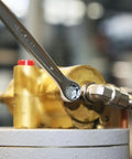 42 Series 17-Piece Metric Wrench Set With 12-Point Box Ends and 15 Degree Offset in use on industrial machinery.