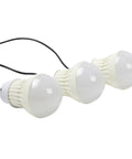 Portable Solar Camping Lantern And Phone Charger Generator System For Outdoor Emergency Backups with three LED bulbs on a wire.