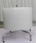 Industrial Grade Wall Mount Vertical Bubble Wrap Dispenser And Heavy Duty Film Packing Station with a roll of bubble wrap on a metal stand.