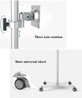 Heavy Duty Floor Standing Monitor Stand With Slick Rolling Wheels And Fold Away Keyboard Tray Fits 10 To 34 Inch Screens Ergonomic Riser Smart Desk Setup Upgrade Hack showing three axis rotation and mute universal wheel.