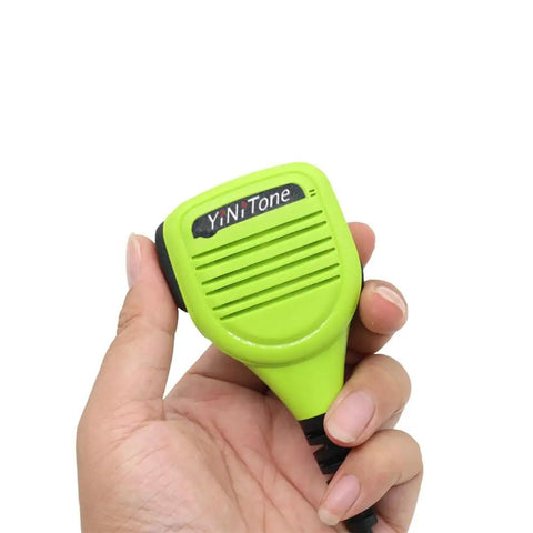 Hand holding a light green 2 Pin K Plug Handheld Speaker Microphone for UV Series Two Way Radios Walkie Talkie Compatible With UV5R BF888S UV82 UV82L UV6R And More.