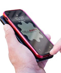 Universal Dual Phone Carrier With Strong Magnetic Mounts For Smart Device Storage, holding two smartphones in hand.