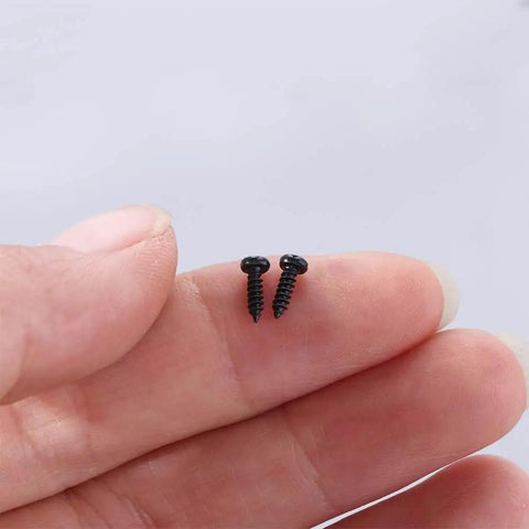 Heavy Duty Micro Self Tapping Screws Pan Head Carbon Steel Black Finish 1000 Pack For Laptop And Tech Repair Precision Fasteners M1 M2 in hand.