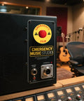 Emergency stop button with yellow ring in music studio
