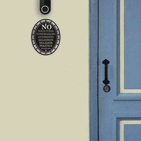 No Soliciting Sign Aluminum Six By Four Point Seven Inch Self Adhesive Metal Door Sign For Front Door Home And Business No Soliciting Religion Fundraising Estimates Salesmen oval black sign on wall beside blue door