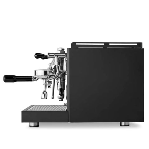 Rock Solid Dual Boiler Espresso Machine Bundle With Precision Grinder And Pid Temp Control To Craft Smooth Barista Drinks Without Any Stress, side view of sleek black espresso machine.