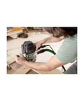 Person using Plunge Router Of 1400 EQ-F-Plus With Ergonomic Grip for precise woodworking on table
