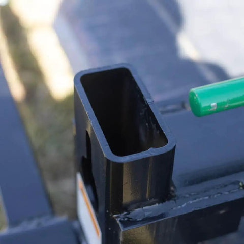 Close-up of metal structure from Beefy 60 Inch Clamp On Pallet Forks For Loaders And Skid Steers, showing mounting point detail.