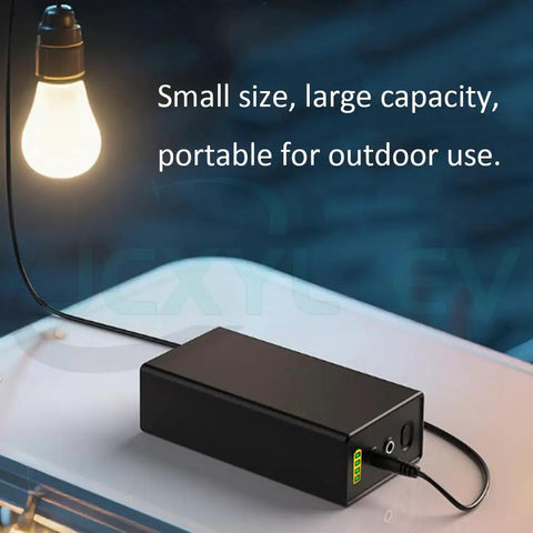 Built Tough For The Long Haul 24V Rechargeable Lithium Backup Battery Pack With Water Resistant Shell For EV And Tools 4000 Mah To 6400 Mah Capacity Zero Hassle Swap next to an illuminated light.