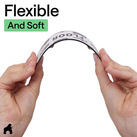 Hands bending Rug Gripper Pads Extra Long Reusable Double Sided Adhesives Keep Rugs Flat at Corners and Stay Put