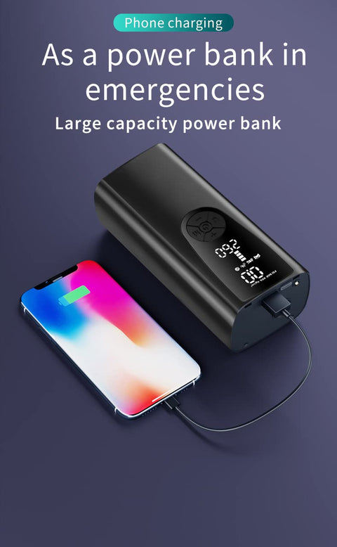 Portable power bank charging smartphone with digital display showing battery percentage.