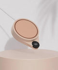 Smart Mug Warmer For Desk Electric Cup Heater With Three Adjustable Temperatures on a sleek beige surface.