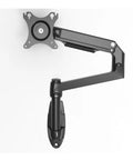 Top Shelf Wall Mount Full Motion Monitor Arm Featuring Heavy Duty Aluminum Housing Super Smooth Spring Swivel for easy angle tweaks and cable runs in matte black.
