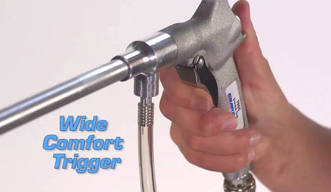 Close-up of Syphon Oil And Solvent Spray Gun With Classic Pistol Grip, highlighting wide comfort trigger and aluminum extension.