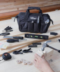 89-Piece Black Household Tool Set With 12 Pocket Tool Bag For Home DIY Projects And Everyday Repairs displayed on wooden table