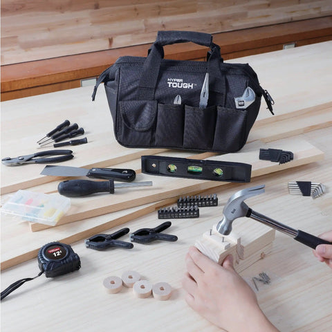 89-Piece Black Household Tool Set With 12 Pocket Tool Bag For Home DIY Projects And Everyday Repairs displayed on wooden table